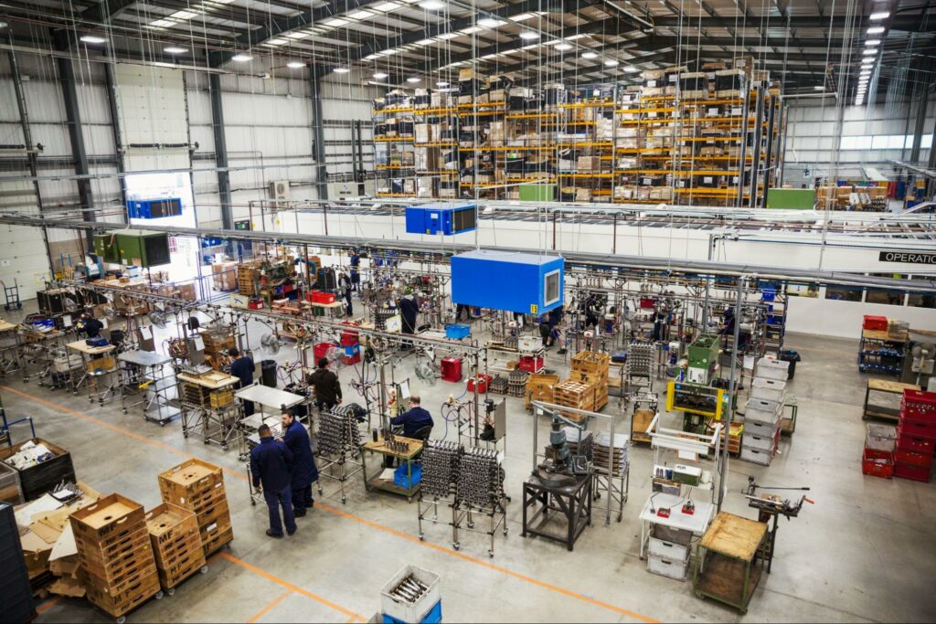 Overview of a modern manufacturing facility with organized workstations and equipment.