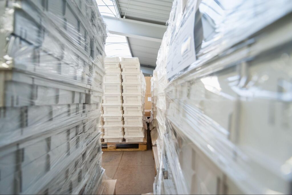 Stacked pallet boxes in a warehouse for efficient storage and organization.