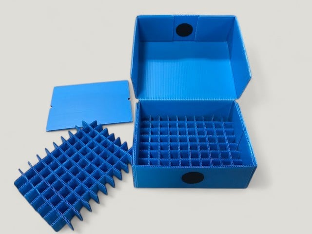 Innovative blue storage box for organizing test tubes and laboratory samples efficiently.