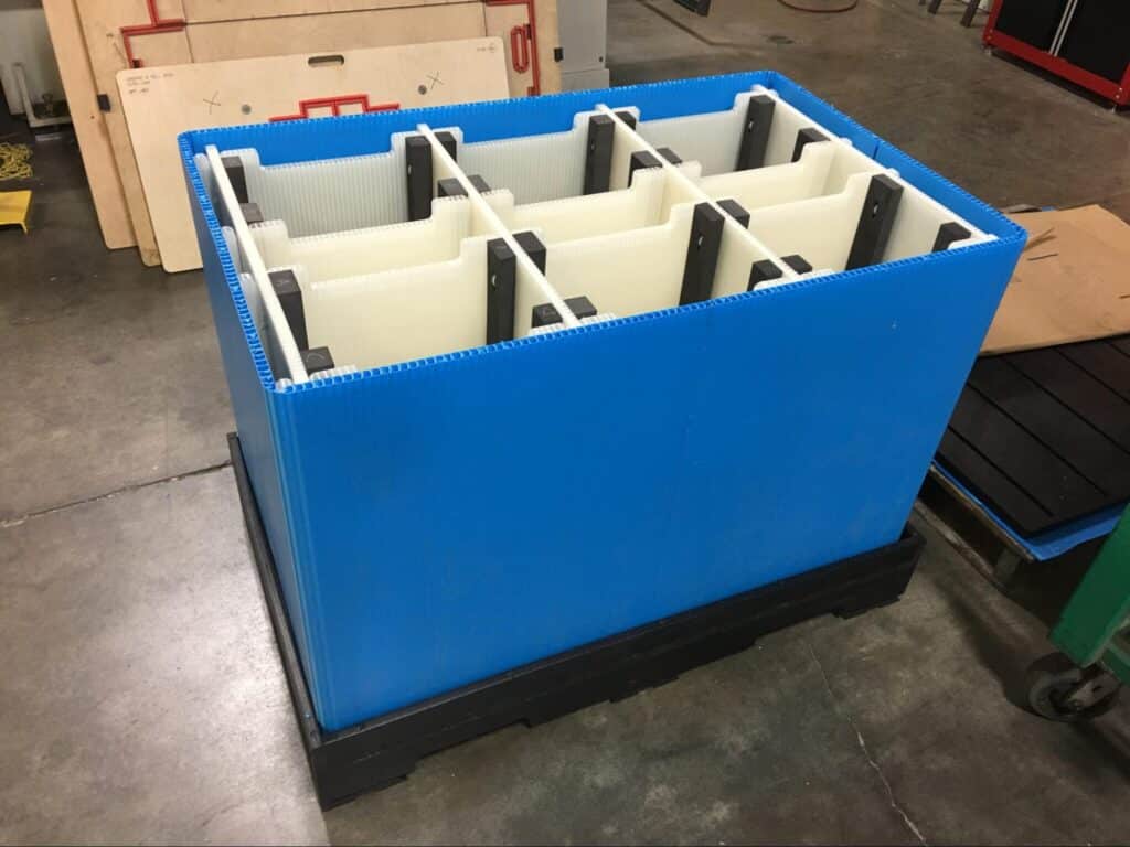 reusable packaging featuring durable dividers for product shipment