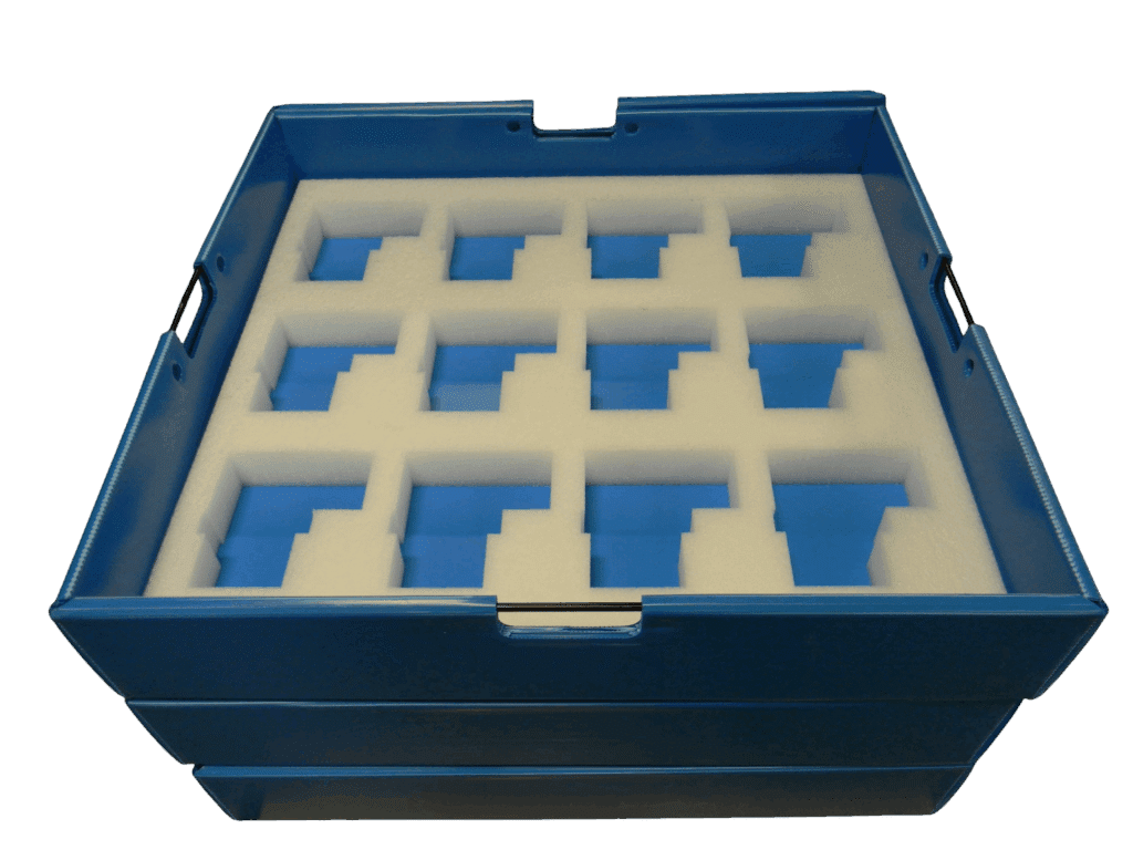 Durable storage box with foam inserts for organized and secure item protection.