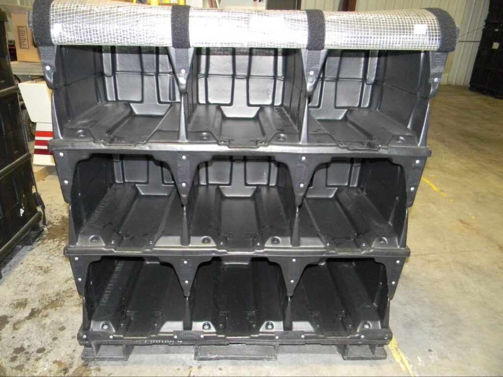 Heavy-duty plastic storage bins with multiple compartments for efficient organization.