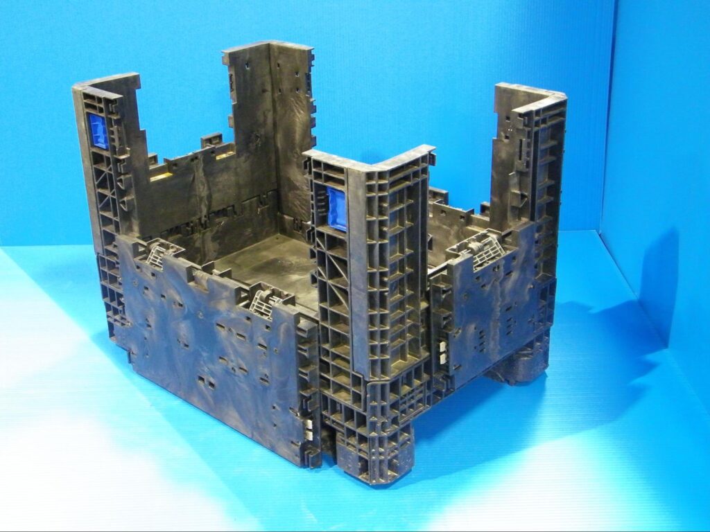 Plastic crate model for storage or transport on a vibrant blue background.
