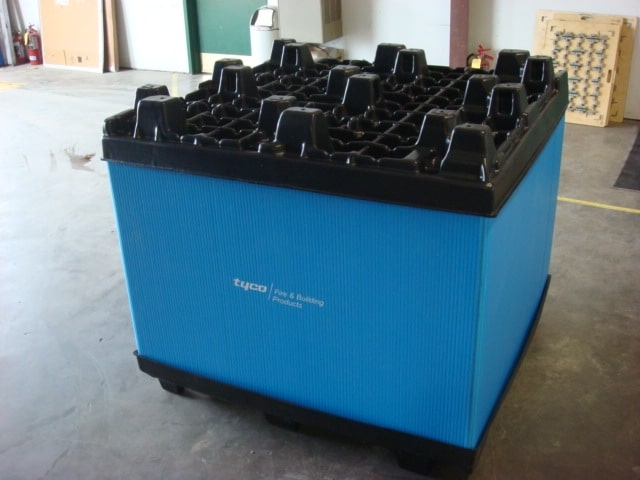 Durable blue shipping sleeve pack for secure and organized transport of goods.