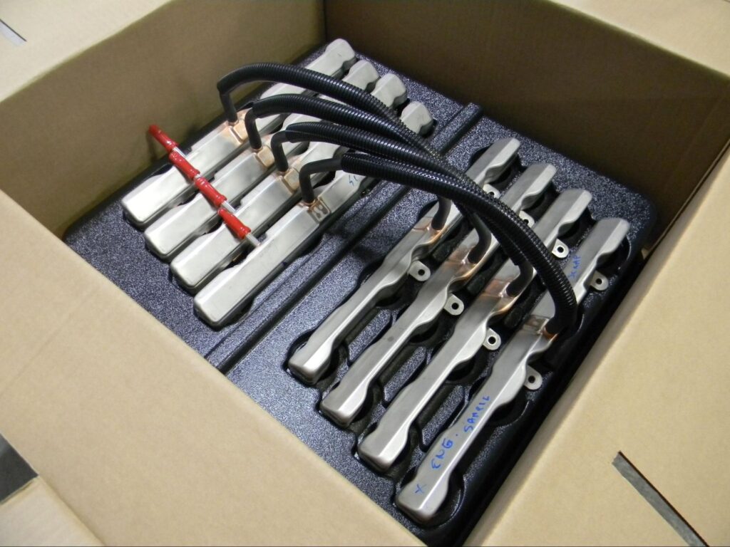 Electrical components securely packed in dunnage for safe shipping and transport.