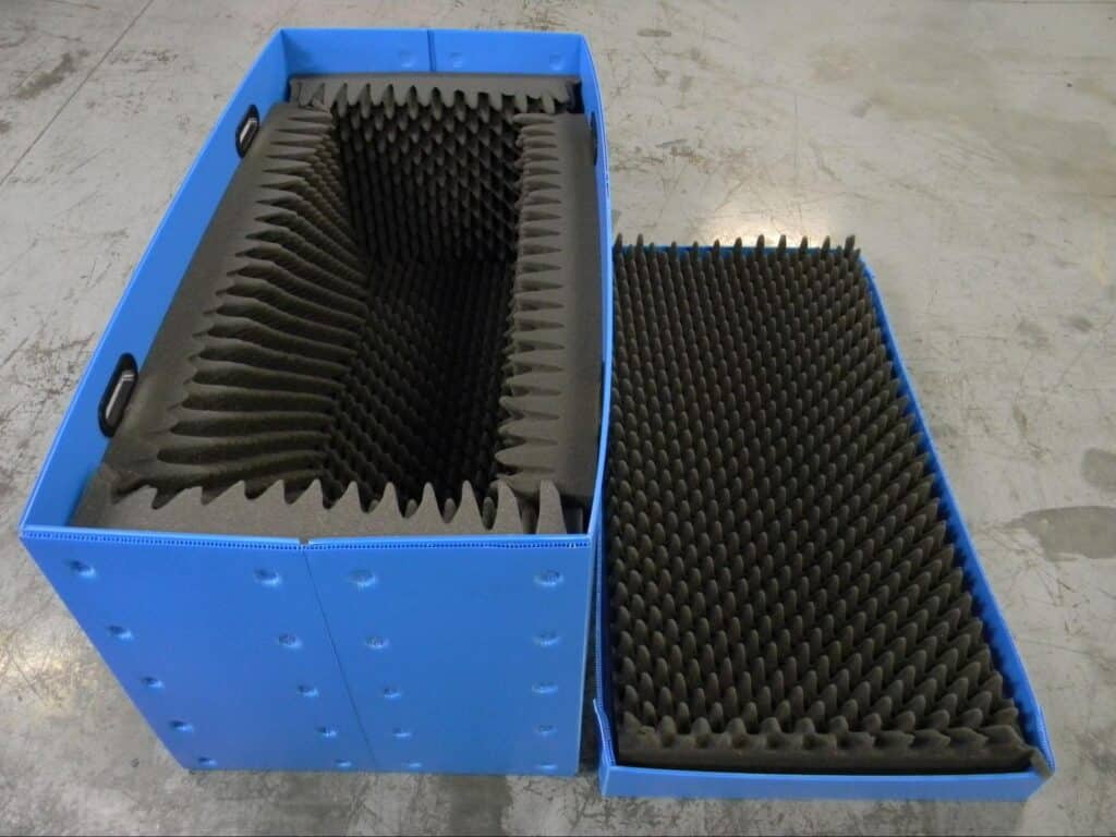Durable foam dunnage solutions in blue containers for secure shipping and handling.